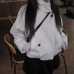Loose quilted jacket with fluffy trim in light gray, styled