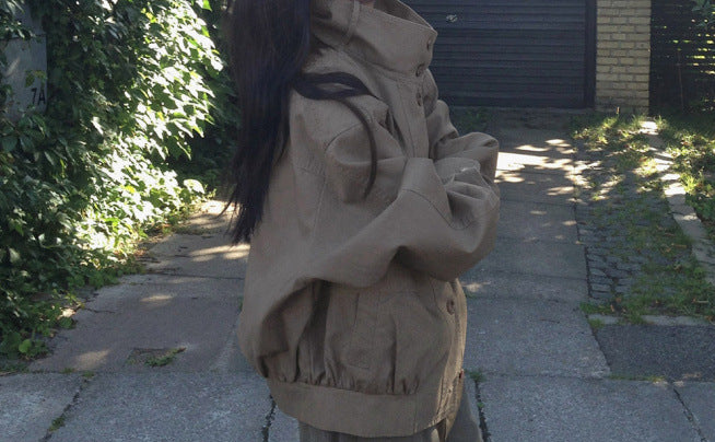 Stand collar drawstring short trench coat, side view with gathered hem
