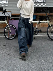 Retro washed wide-leg buttoned hem jeans in dark blue, street style