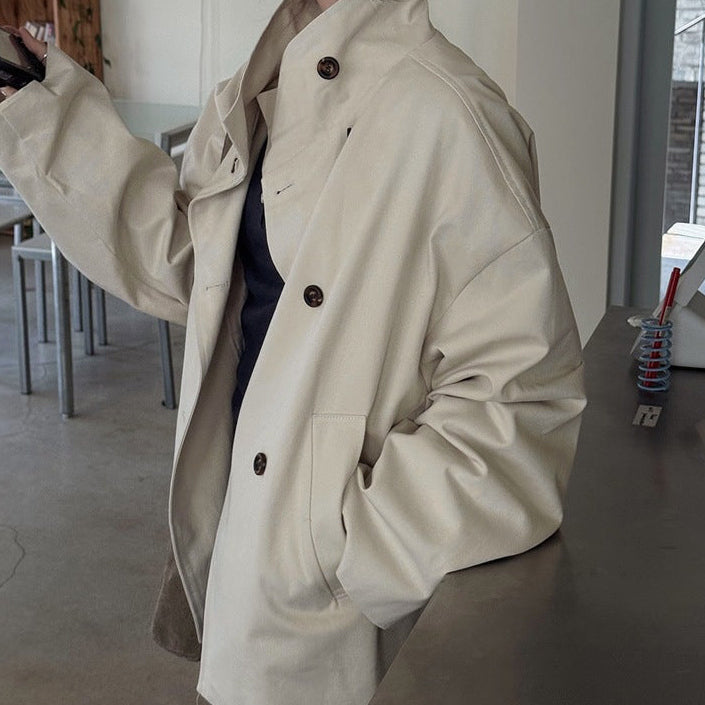 Double-breasted cropped trench jacket in beige, side view