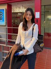 Low round-neck open-knit cardigan
