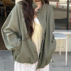 Drop shoulder vintage distressed stand collar jacket in army green, front view