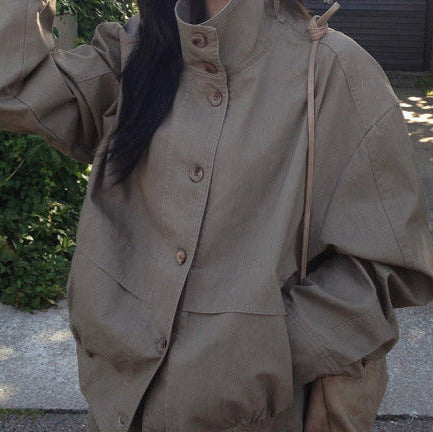Stand collar drawstring short trench coat, front view