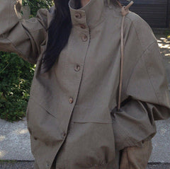 Stand collar drawstring short trench coat, front view