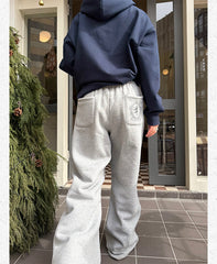 Printed fleece cuffed sweatpants in gray, back view