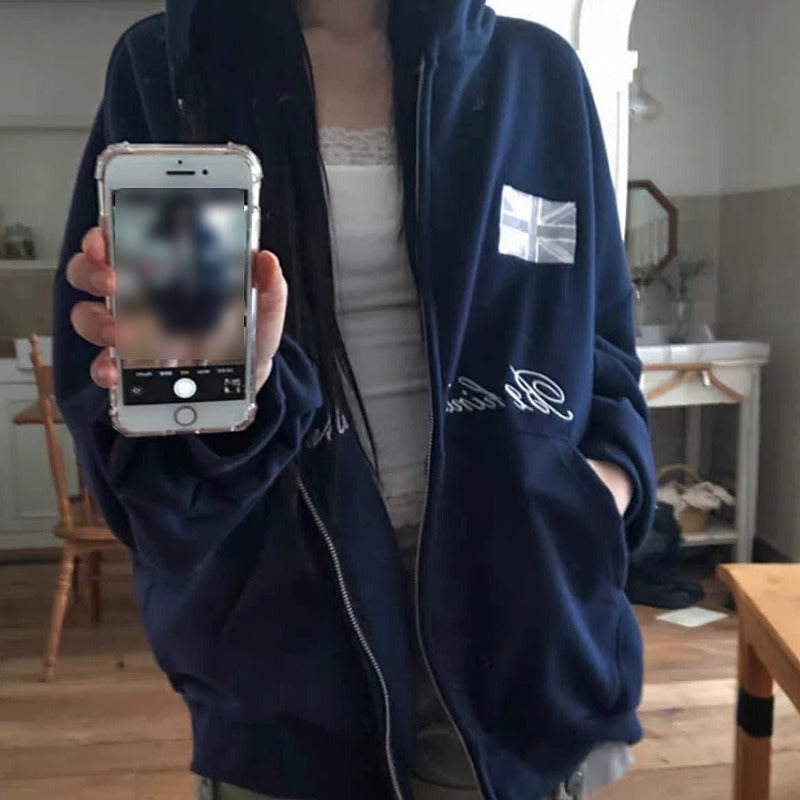 Embroidered oversized zip-up hoodie in navy blue, hood up