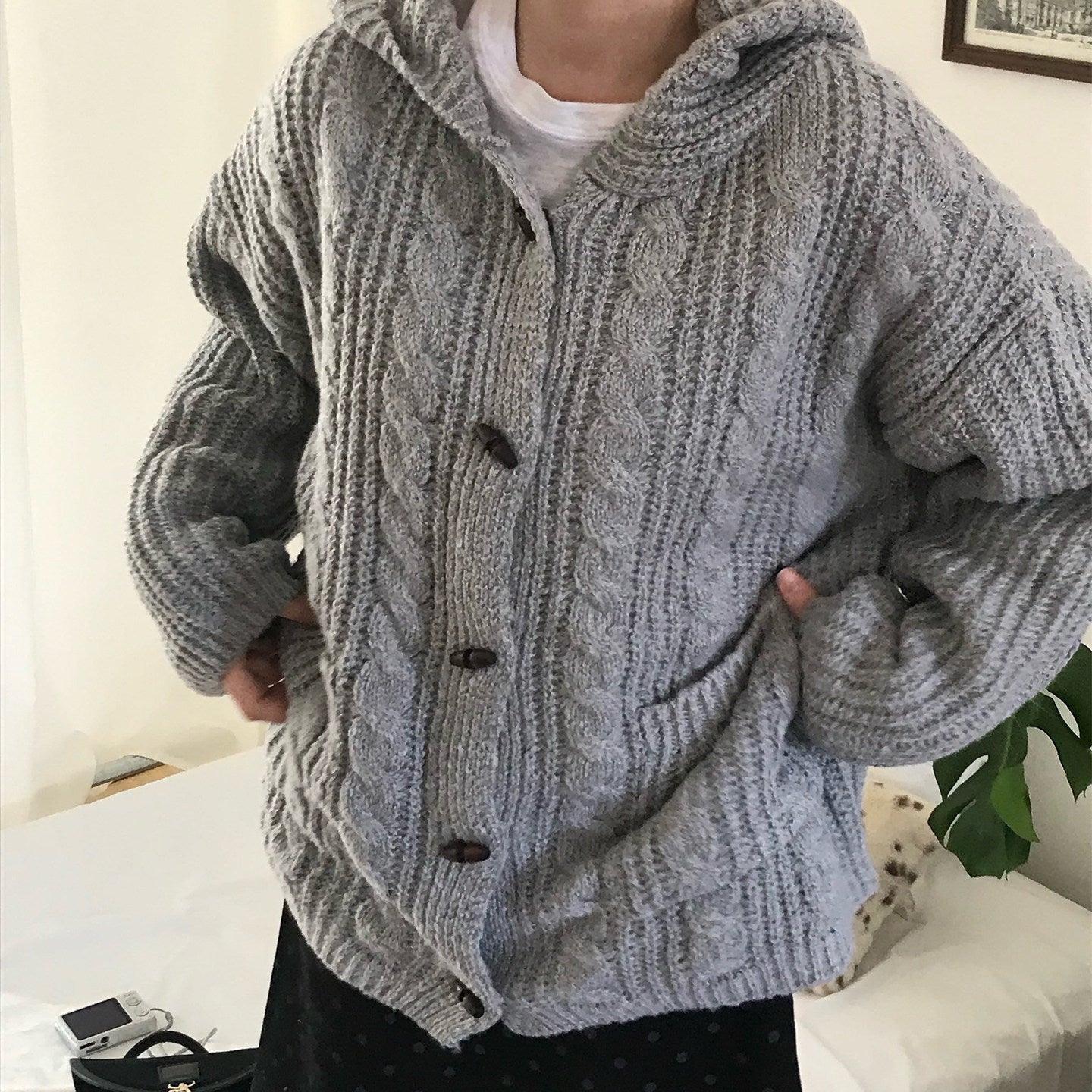 Oversized hooded cable knit cardigan in gray, cable knit close-up