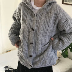 Oversized hooded cable knit cardigan in gray, cable knit close-up