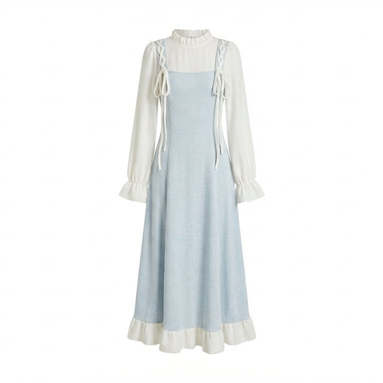 Light blue dress with white long-sleeve top on a white background