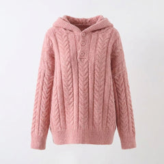 Pink knitted hoodie on a light gray background