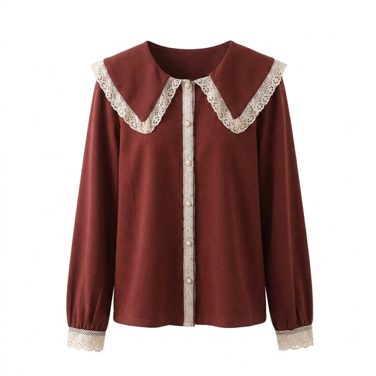 Brown blouse with lace details on a white background