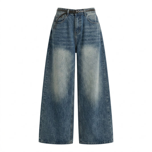 A pair of wide-leg blue denim jeans with a faded light wash on the front of the legs, shown against a plain white background.