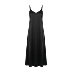 Black slip dress on a white background