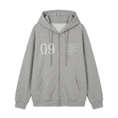 A light gray heather zip-up hoodie with a white stencil-style '09' graphic on the left chest and small white text on the right chest, displayed against a solid white background.