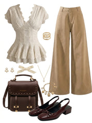 Collection of clothing and accessories including a dress, pants, shoes, and bags on a white background.