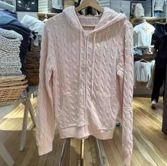 Women's hooded cable knit pullover with zipper opening