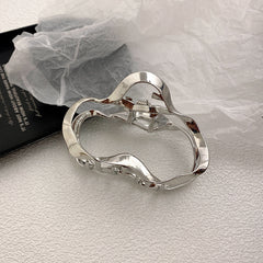 Geometrically Irregular Metal Hairpin