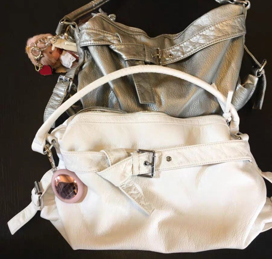 Vintage motorbike leather shoulder bag in White, shown with the silver bag