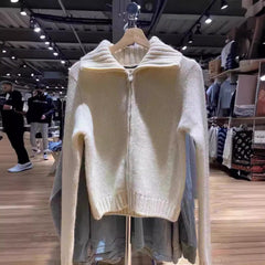 Knitted sweater that fits well and flatters the figure, a slimming top