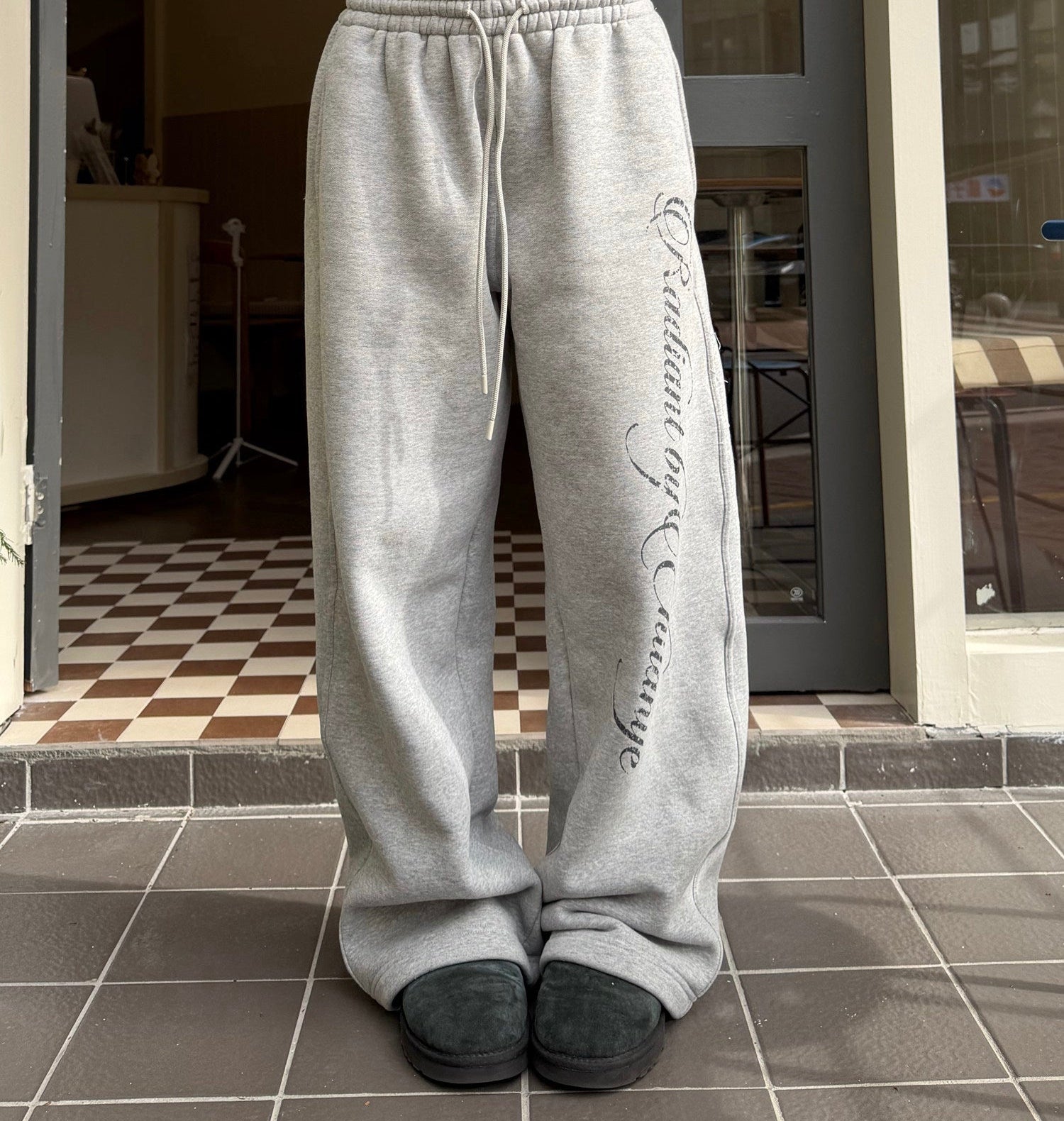Printed fleece cuffed sweatpants in gray, front view