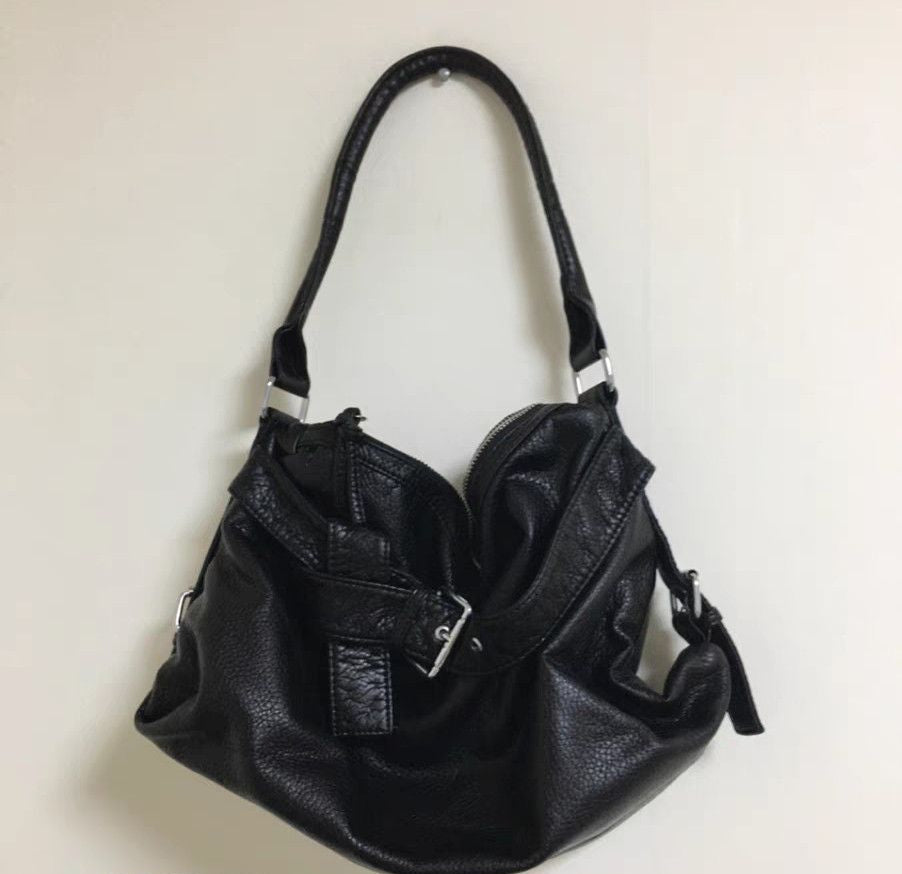 Vintage motorbike leather shoulder bag in Black, front view