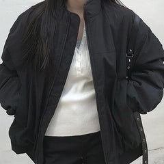 Stand-up collar pleated pilot sleeve padded jacket in black, front view