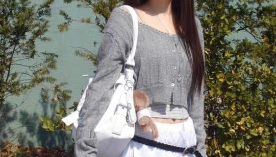 Vintage motorbike leather shoulder bag in White, styled outfit