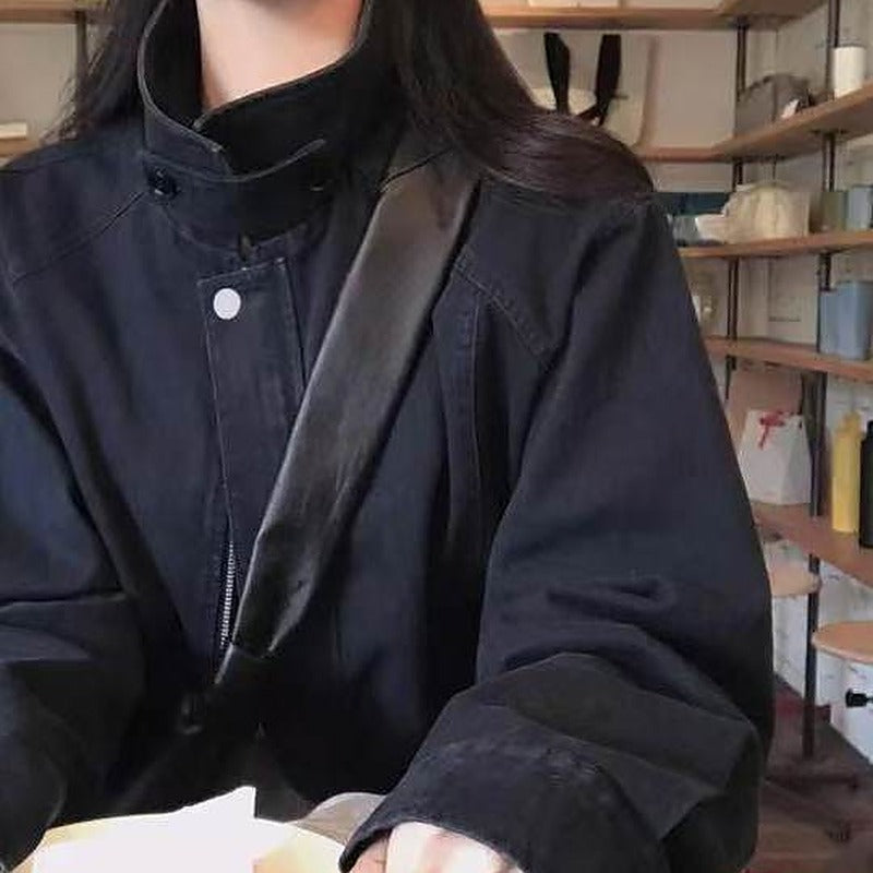Korean style stand collar zip jacket in navy blue, styled at a cafe