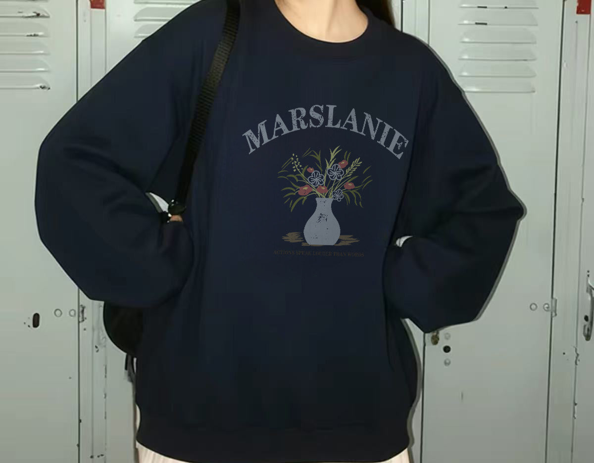 Cotton crew neck sweatshirt in navy blue, angled view