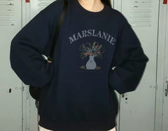 Cotton crew neck sweatshirt in navy blue, angled view