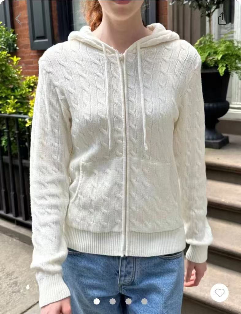 Women's hooded cable knit pullover with zipper opening