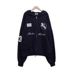 Embroidered oversized zip-up hoodie in navy blue on hanger