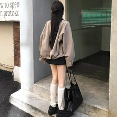 Lapel loose-fit short trench coat in Khaki, back view