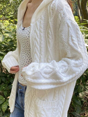 White hooded cable-knit sweater