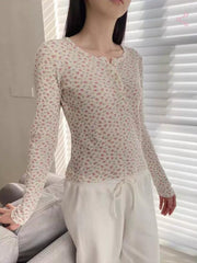 Floral-patterned buttoned short blouse