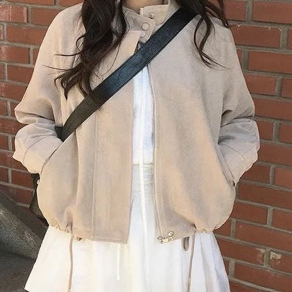 Swing drawstring deerskin fleece jacket in off-white, styled with crossbody bag