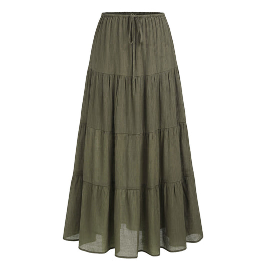 Long tiered skirt in olive green on a white background