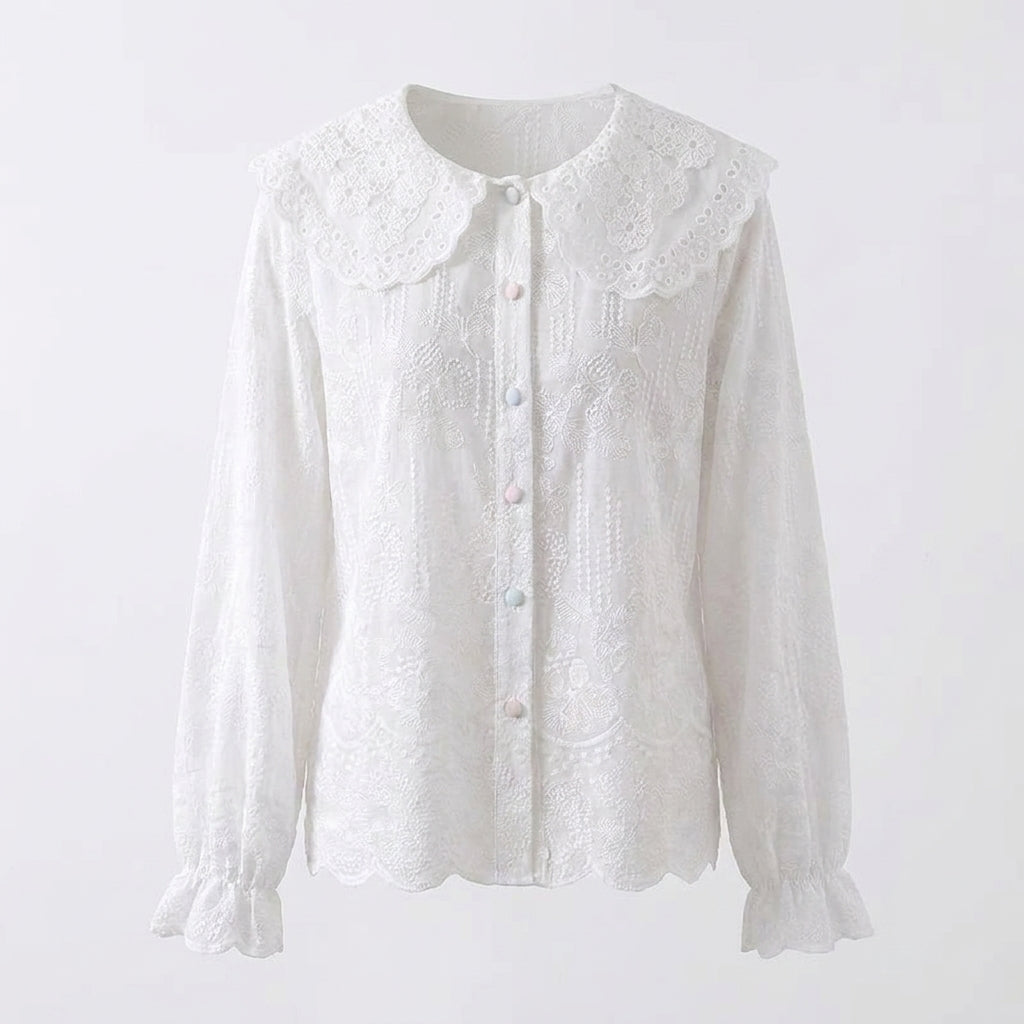 White lace blouse on a light gray background