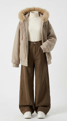 A mannequin styled with a beige sherpa jacket featuring a brown faux-fur trimmed hood, brown wide-leg pants, a cream turtleneck, and white sneakers, set against a plain light gray background.
