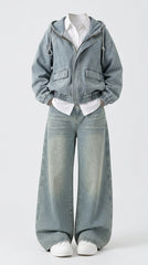 A child's outfit consisting of a light blue denim hooded jacket, matching wide-leg denim jeans, a white collared shirt, and white sneakers, displayed on a headless mannequin against a light gray background.