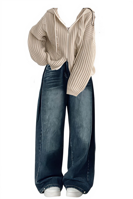 Striped shirt over a plain top with wide-leg jeans on a white background