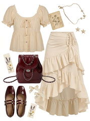 Collection of beige top, ruffled skirt, red handbag, shoes, and accessories on a white background