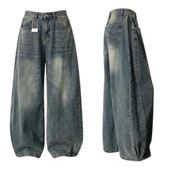 Wide-leg faded blue denim jeans shown from the front and side views on a plain white background.