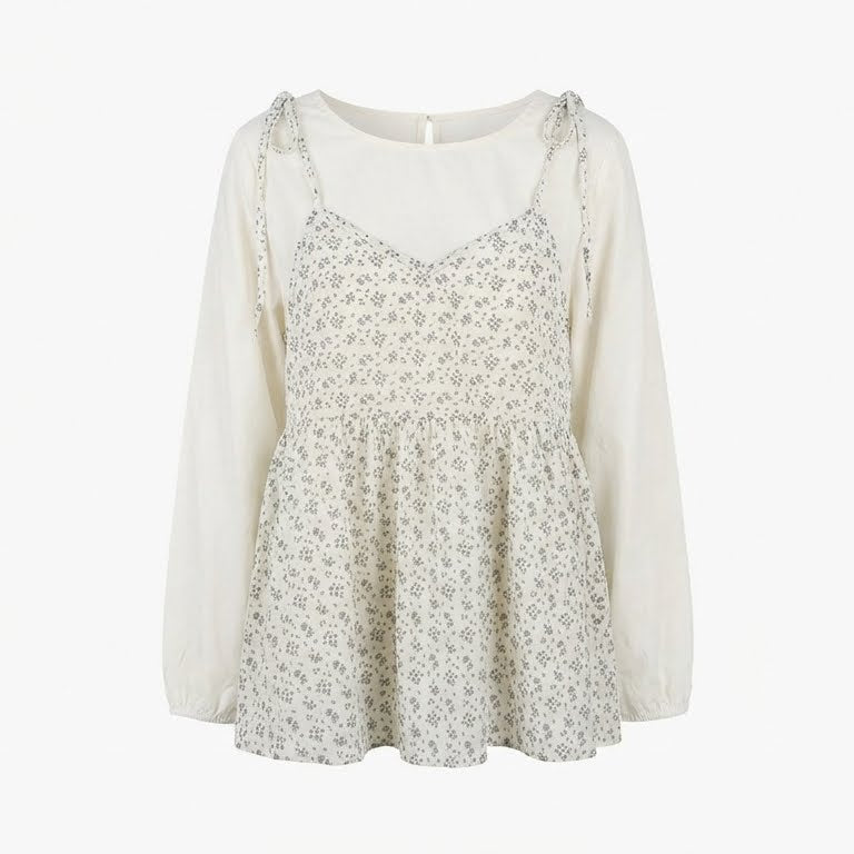 Floral blouse with long sleeves on a white background