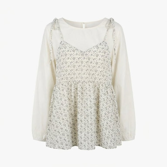 Floral blouse with long sleeves on a white background