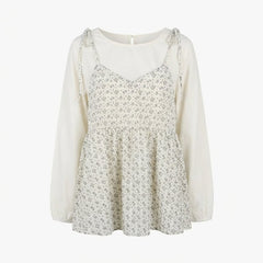 Floral blouse with long sleeves on a white background