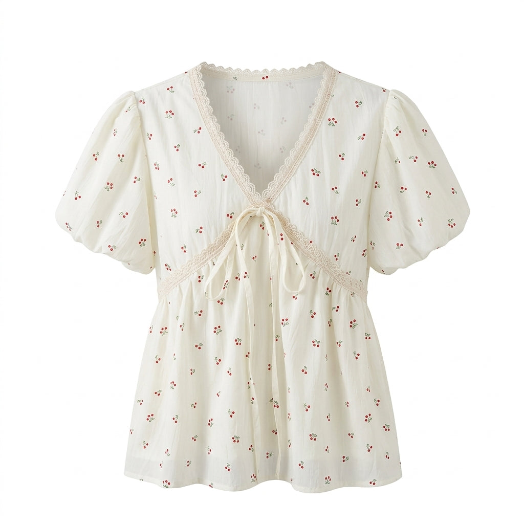 White blouse with floral pattern on a white background