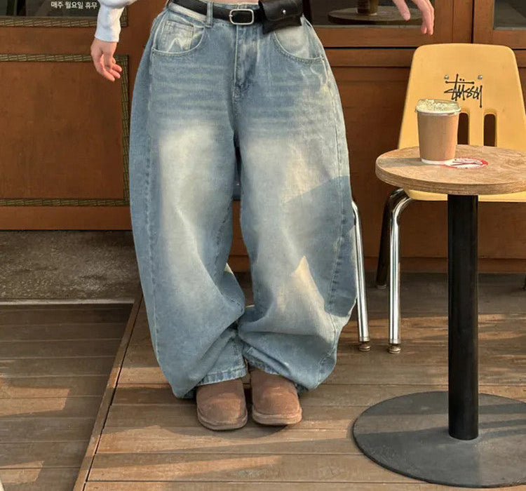 Retro washed wide-leg buttoned hem jeans in light blue, front view