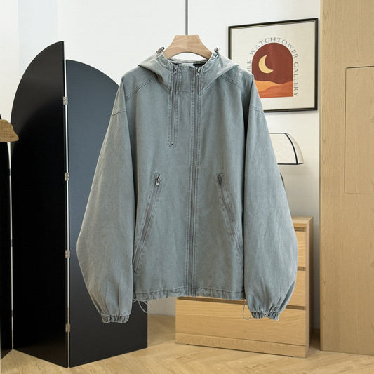 Vintage washed cotton hooded workwear zip-up jacket in grey, front view on hanger
