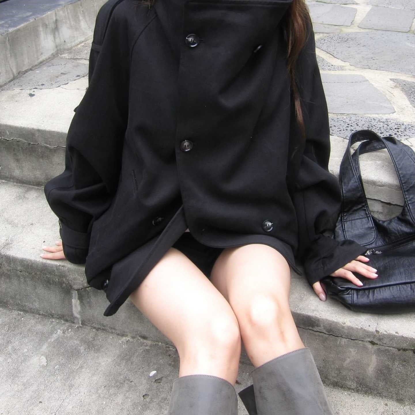Oversized stand collar double-breasted jacket in black (color 2), seated view